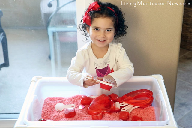 Having Fun with the Valentine's Day Sensory Bin with Practical Life and Math Activities