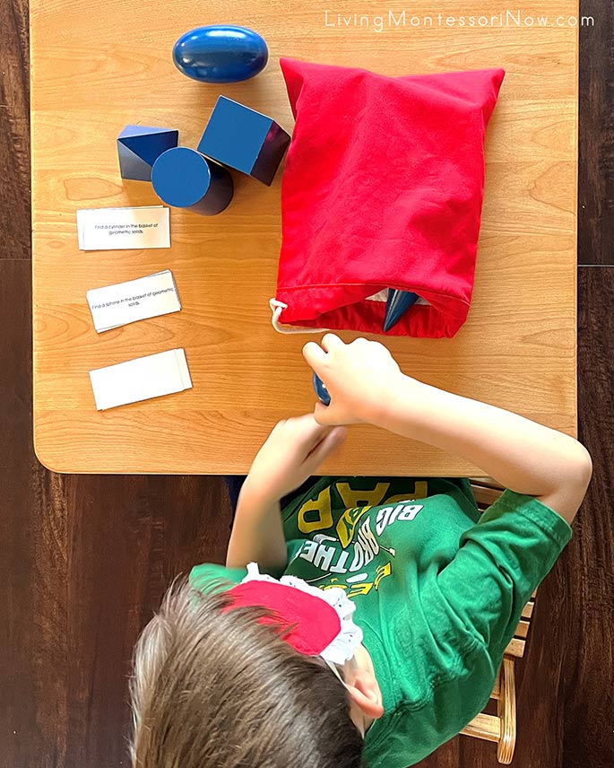 Using Geometric Solids and Montessori Print Shop Geometric Solids Command Cards with a Blindfold