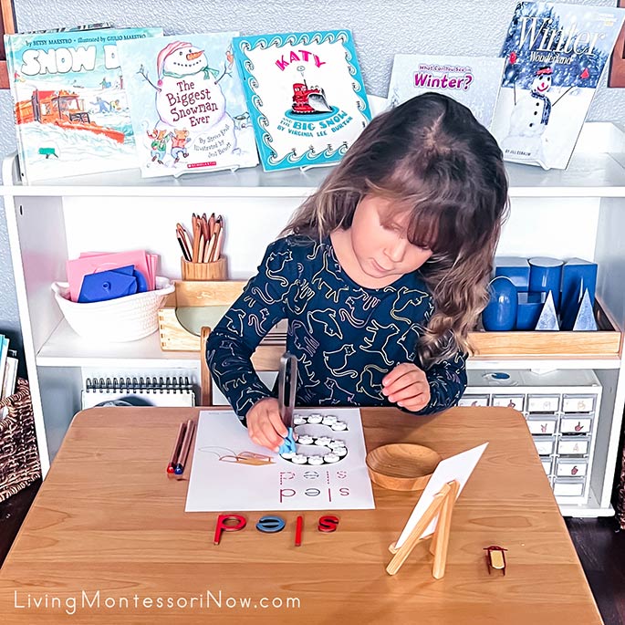 Using Hand-Shaped Tongs to Place Snowflakes on Sled Do-a-Dot Printable